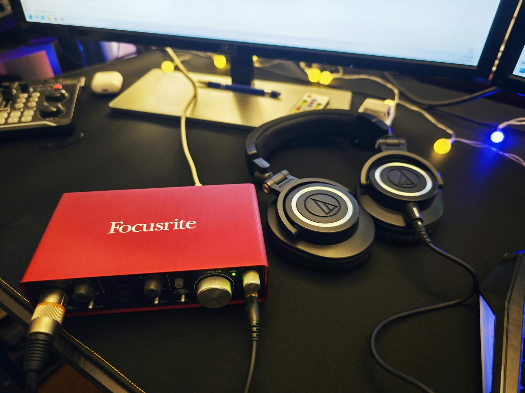 recording studio setup with audio interface and headphones
